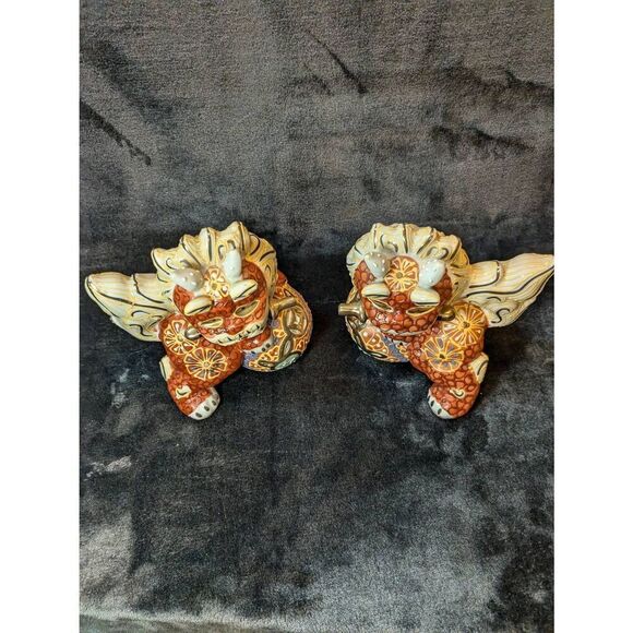 Pair of vintage foo dog Chinese pottery statues in excellent condition